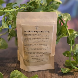 May include: A kraft paper bag of dried Ashwagandha root. The label includes brewing instructions, storage information, and an allergen advisory. The text on the bag reads "Dried Ashwagandha Root" and "HA3-ASH".