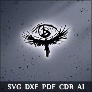 May include: A black graphic design featuring a stylized eye with a central shuriken-like pupil, surrounded by feathered wings extending outward. The text SVG DXF PDF CDR AI is printed in white at the bottom of the image against a textured background.