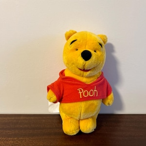 Peluche Mattel/Arcotoys de Winnie l&#39;ourson 20 cm chez VelmasVintageToys
