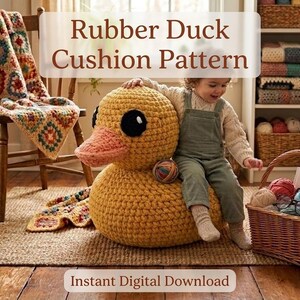 May include: A large, yellow crocheted rubber duck cushion with black eyes and a pink beak. A child sits on the duck. The image includes a basket of yarn, a crocheted blanket, and the text "Rubber Duck Cushion Pattern" and "Instant Digital Download".