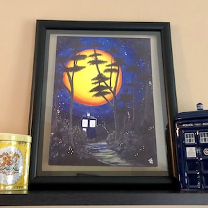 8.5 x 11 print of The Moon lit Tardis