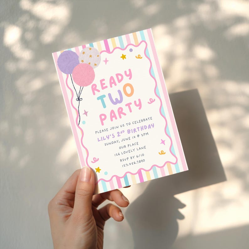 May include: A rectangular birthday invitation card featuring a pastel striped border and a wavy frame. The text reads READY TWO PARTY, PLEASE JOIN US TO CELEBRATE LILY'S 2ND BIRTHDAY, SUNDAY, JUNE 14 @ 2PM, OUR PLACE, 126 LOVELY LANE, RSVP BY 6/10, 123.456.7890.