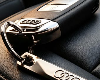 Llavero de lujo con el logotipo de Audi, elegante llavero de barra de metal, accesorio premium para automóviles, regalo para propietarios de coches Audi.