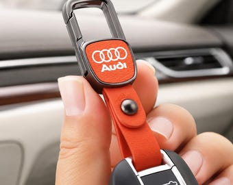 Llavero Audi de cuero naranja con clip metálico para llaves, estilo personalizado, regalo para propietarios de Audi.