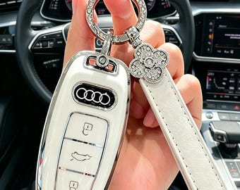 Funda para llave de Audi con diseño de trébol de cuatro hojas, llavero con diamantes de imitación blancos, estuche para llave de coche de la suerte, bonito regalo para novia, accesorio para coche