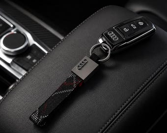 Llavero Audi para coche, de cuero trenzado, con anilla metálica para llaves, accesorio de estilo para el interior del coche, regalo para hombre.