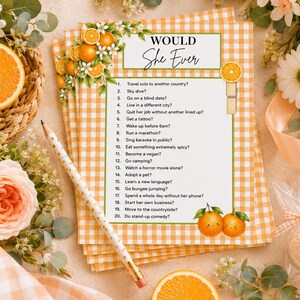 May include: A stack of game cards with a white and orange gingham border, featuring the text Would She Ever and a list of twenty numbered questions. The design includes illustrations of orange slices, blossoms, and two smiling orange characters.