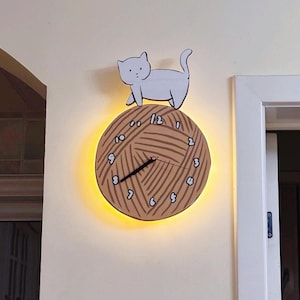 Reloj 3D de ovillo de lana con forma de gato: decoración original con gatitos, mecanismo silencioso (iluminación LED opcional).
