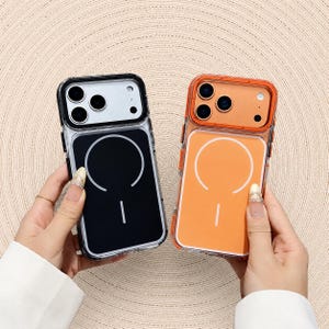 Peut inclure: Deux coques de téléphone, une noire et une orange, sont présentées. Chaque coque a une bordure transparente et un intérieur coloré avec un motif circulaire blanc et une ligne verticale. Les coques sont posées sur un fond neutre et texturé.