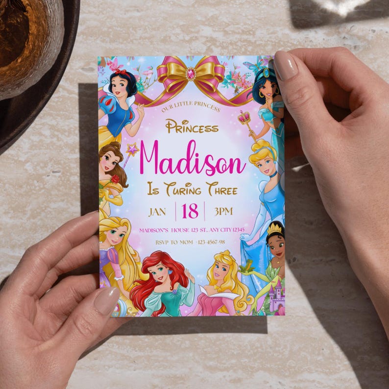 May include: A colorful invitation featuring Disney princesses, with the text "Princess Madison Is Turning Three." The invitation includes the date, time, and RSVP information. The design incorporates a pink and gold bow and floral accents.