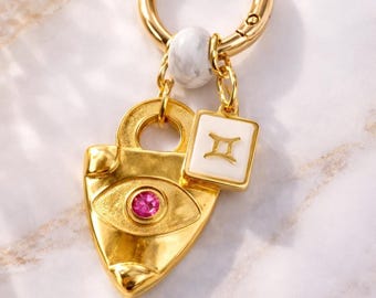 Gemini Zodiac Keychain – Gold Shield Charm with Pink Crystal, Howlite Bead & Astrology Talisman