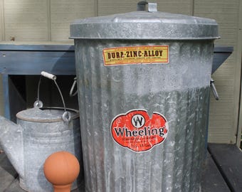 Contenedor de basura vintage de metal galvanizado con ruedas y asas de 15 galones