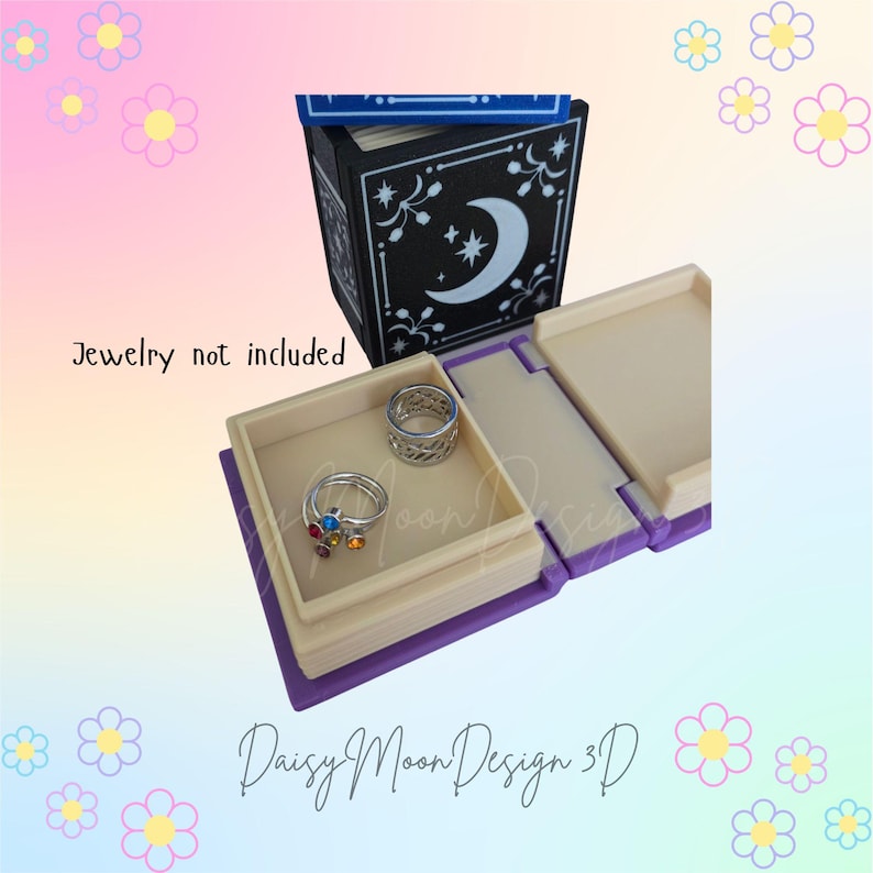 May include: A white ceramic mug with a black handle and the text "But First, Coffee" in a bold, black font. The mug is set against a blurred background, suggesting a cozy setting.