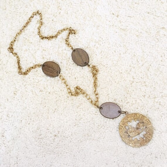Vintage 1970s Brass and Wood Aquarius Necklace --