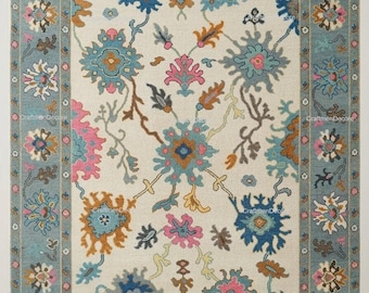 Alfombra de lana tejida a mano, alfombra botánica color crema y azul cielo, alfombra de piso con estampado floral colorido.