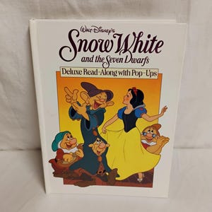 May include: A set of three ceramic mugs with a speckled, matte finish. Each mug features a different color: light blue, cream, and gray. The mugs have a simple, modern design and a comfortable handle.