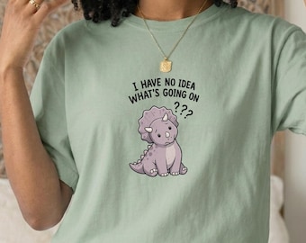 Camiseta "No tengo ni idea de lo que está pasando", camiseta de dinosaurio confundido, camiseta divertida sobre la ansiedad, camiseta para introvertidos, camiseta con estampado de dinosaurio adorable, regalo con humor con el que te identificarás