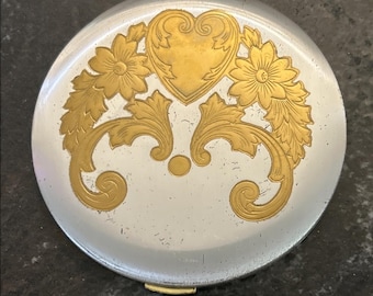 Espejo compacto de maquillaje REX Fifth Avenue vintage de los años 50, latón esmaltado en tono dorado.