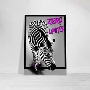 May include: Black and white zebra art print with the words "ZERO LIMITS" in bright pink. The zebra is depicted in a stylized, graphic manner, with bold stripes. The background is a light gray, and the print is framed in black.