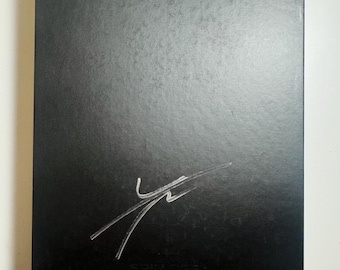 Album autografato da Yunho degli ATEEZ