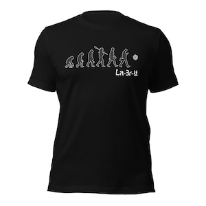 May include: Black t-shirt featuring a white evolution of man graphic. The graphic shows a progression from ape to modern human, ending with a person holding a phone. The text "La-3r-it" is below the graphic.