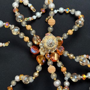 Suncatcher, Handmade, Beaded Octopus.  Can hang it sit.