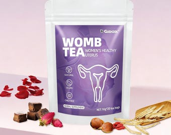 May include: A white pouch of "Womb Tea" with a purple label featuring text and a uterus illustration. The label also includes "Women's Healthy Uterus", "Natural", "Vegan", and "GMO Free". Tea bags, rose petals, and other ingredients are scattered around the pouch.