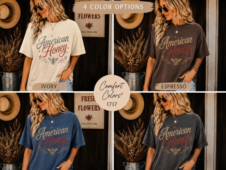 May include: Four short-sleeved t-shirts in ivory, espresso, blue, and grey. Each shirt displays the text "American Honey" with a bee graphic. The shirts have a vintage style. The image also includes the text "Comfort Colors 1717".