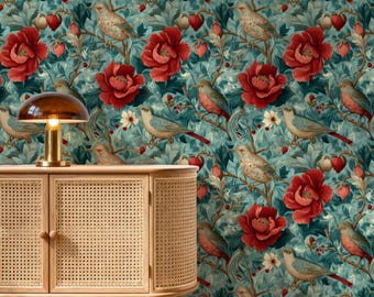 May include: A teal wallpaper with a repeating pattern of birds, red flowers, and green leaves. A wooden cabinet with a woven front and a gold lamp are in the foreground.