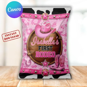 May include: A rectangular chip bag wrapper featuring a pink leopard print background with black cow spots at the top and bottom. A central wooden barrel design displays the text Isabella's FIRST RODEO, a pink cowboy hat, and pink boots.