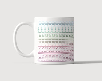 May include: A white ceramic mug featuring the repeated text 'kindly shut the f*** up' printed in vertical columns of varying colors including blue, green, yellow, pink, and purple, arranged in a repeating pattern across the side of the mug.