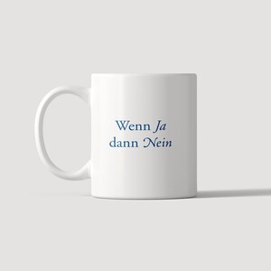 May include: A white ceramic mug featuring the dark blue text "Wenn Ja dann Nein" printed in a serif font on the front. The mug has a standard cylindrical body with a curved handle on the left side, providing a simple and functional design.