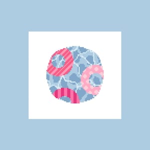 May include: A circular pixel art design featuring a light blue background with a darker blue grid pattern. Overlaid on this are three distinct semi-circular shapes in shades of pink and red, each decorated with different patterns including stripes and dots.