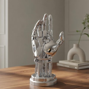 Silver Robotic Hand Sculpture Chrome Cyberpunk Mechanic Arm Figurine Modern Industrial Art Decor SciFi Shelf Accent Futuristic Home Ornament