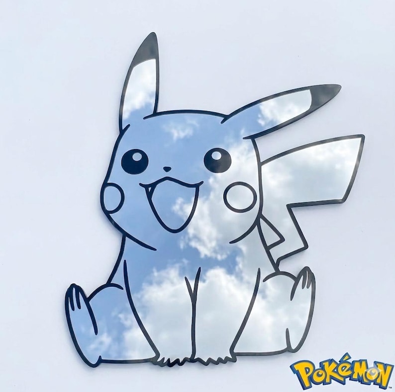 May include: A Pikachu-shaped mirror with a black outline, reflecting a cloudy sky. The cartoon character is sitting with its tail and ears visible. The Pokemon logo is in the bottom right corner.