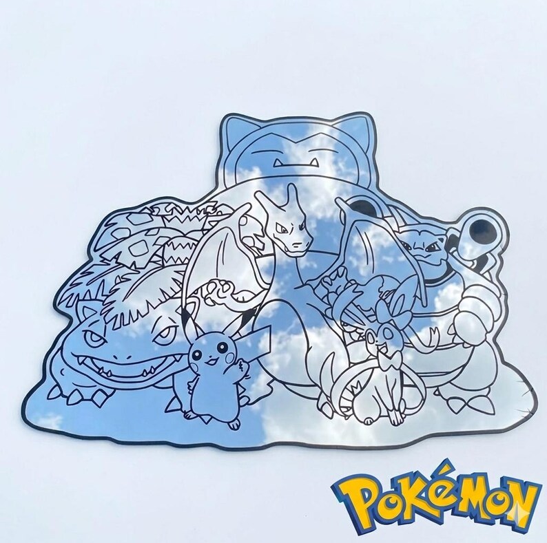May include: A black and white illustration of various Pok&eacute;mon characters, including Pikachu, Charizard, and Snorlax. The image has a reflective surface, with the Pok&eacute;mon logo in the bottom right corner.