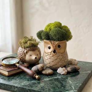 May include: A handmade, wooden cutting board with a natural finish. The board features a juice groove and a handle for easy carrying. Dimensions are approximately 18 inches long, 12 inches wide, and 1 inch thick.