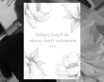 以下が含まれることがあります： 白いブライダルパーティーハンドブック、花のイラスト付き。「Wedding of Jeremy & Ava」と「BRIDAL PARTY HANDBOOK」の文字と日付「10.25.25」が表紙に記載されています。デザインには、シャクヤクの繊細な線画が含まれています。