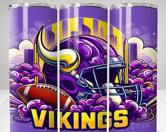 May include: A cylindrical tumbler with a clear straw featuring a purple and yellow graphic design. The artwork displays a football helmet with a horn, a football, and the word VIKINGS in bold yellow letters against a purple background with clouds.