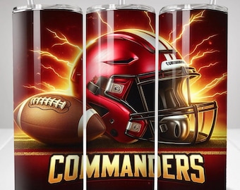 May include: A cylindrical tumbler with a clear straw featuring a red football helmet, a brown football, and yellow lightning bolts against a dark background. The word COMMANDERS is printed in bold gold letters at the bottom of the design.