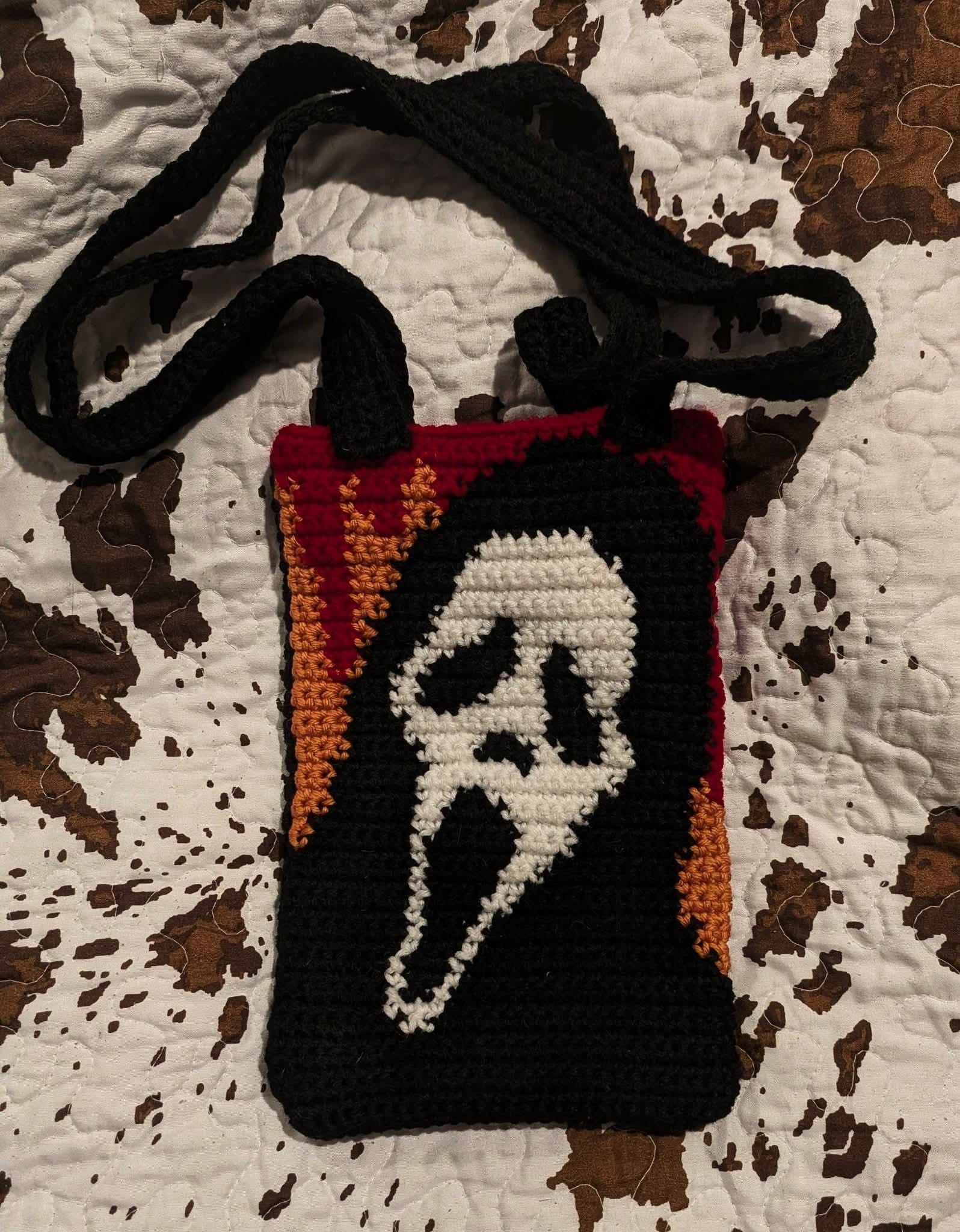 24 Ghostface Crochet Patterns for Spooky Decor, Gifts, and Amigurumi Fun 19 Slasher Flame Bag Crochet Pattern