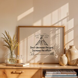 May include: A white ceramic mug with a black handle and the text "But First, Coffee" in a black, handwritten-style font. The mug is on a white surface.