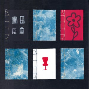 May include: A collection of six handmade journals with unique covers. The covers feature various designs, including a black cover with white window illustrations, a red cover with a black flower, and covers with blue and white abstract patterns. Each journal is bound with gold thread.