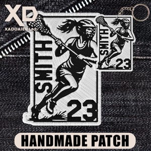 May include: A white ceramic mug with a black handle and the text "But First, Coffee" in a black, handwritten-style font. The mug is on a white surface.