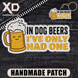 May include: Embroidered patch and keychain set featuring a beer mug design and the text "IN DOG BEERS I'VE ONLY HAD ONE." The patch and keychain show a smiling beer mug graphic with white foam. The patch also has the text "HANDMADE PATCH."