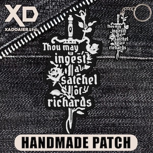 May include: Black and white embroidered patch and keychain featuring a sword design with floral accents and the text "Thou may ingest a satchel for richards." The patch is labeled "HANDMADE PATCH."