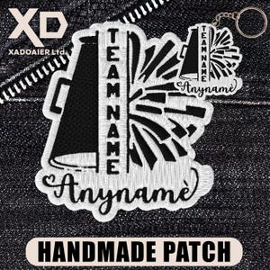 May include: Black and white embroidered patch with a megaphone design and the text "TEAM NAME" and "Anyname". A keychain with a similar design is also visible. The words "HANDMADE PATCH" are at the bottom.