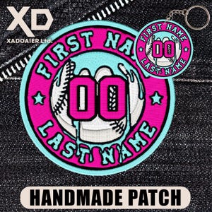 May include: A handmade baseball-themed patch and keyring. The patch is circular with a pink and light blue design, featuring the text "FIRST NAME" and "LAST NAME" around a baseball with the number "00". The keyring mirrors the patch design.