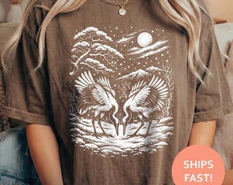 Camiseta japonesa con diseño de grullas, camiseta con estampado de grullas, camiseta con estampado de aves japonesas, camiseta con estampado de naturaleza zen, camiseta con estampado de fauna japonesa.