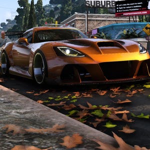 May include: An orange sports car with a sleek design is parked on a city street. The car has a low profile, a prominent front spoiler, and a rear wing. The road is covered in fallen leaves. The car is approximately 4.9 metres long.